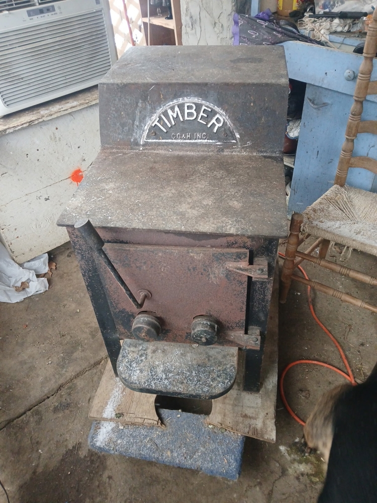 CAST IRON WOOD STOVE,